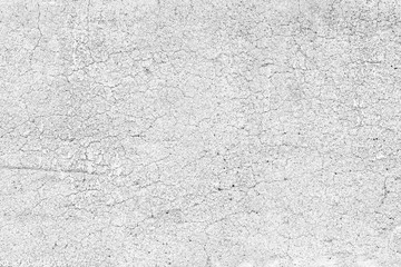 Weathered pale and aged concrete wall texture background in black&white.