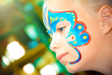 Pretty Girl Child with face painting. Make up.