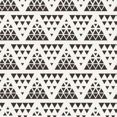 Seamless triangle halftone gradient pattern.