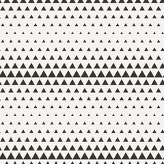 Seamless triangle halftone gradient pattern.