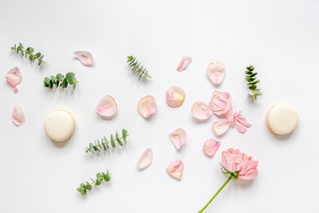 spring pattern with macaroons and flower in soft light top view