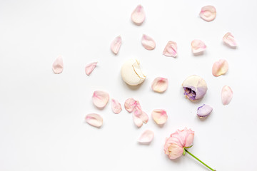 woman breakfast with rose and macaroons white table top view mockup