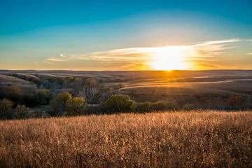 Fotobehang Zonsondergang in de Flint Hills Kansas © Art