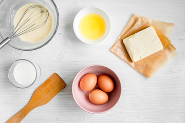 cooking pancake on white background top view ingredients for making