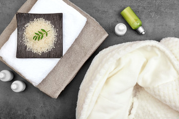 Beautiful spa composition with bathrobe and accessories