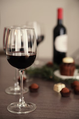 Glass of red wine on blurred background