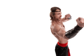 Actor Athlete man in trousers with naked torso posing on a white background in studio