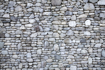 a stone wall looks firm and strong