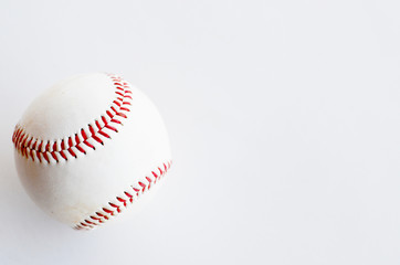 Isolated all american baseball on white background.  Red seams showing, great closeup for sport or athlete background.