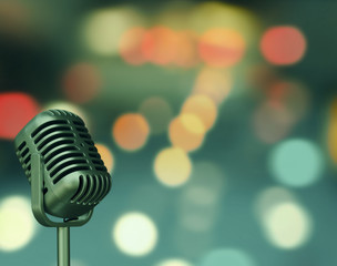 Selective focus, vintage microphone in meeting room or conference room with blurred light background for business and education concepts