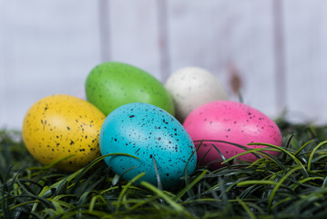 Easter eggs sitting on grass