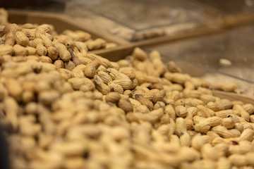 A bunch of Peanut shells in grocery store.