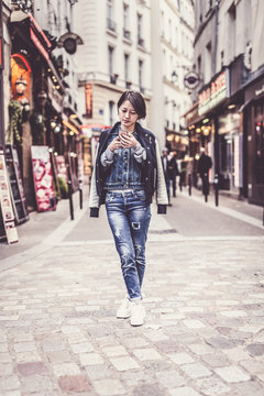Young Chinese Woman Having Fun In Latin Quarter
