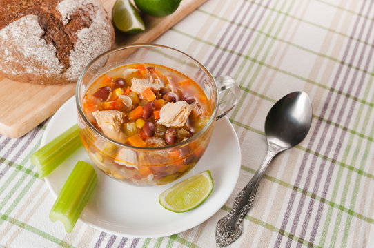Mexican soup with chicken, celery and vegetables