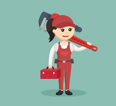 female plumber holding tool box and giant pipe wrench
