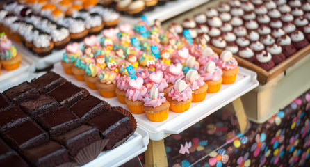 Fresh cakes, Multiple cupcakes, Many bakery.