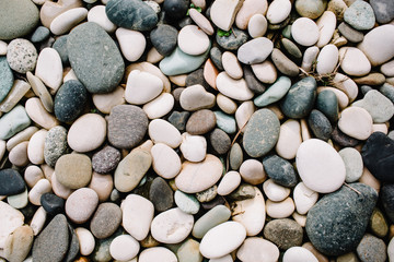 Neutral pattern of pale stones. Flat lay, top view
