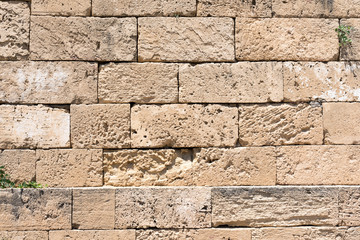 Background from a brown natural stone wall