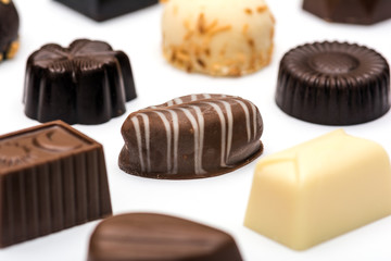 Chocolate candies on a white background