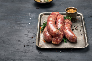 Set of raw sausages for the grill close up