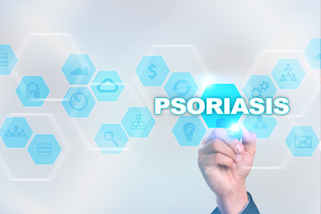 Medical doctor drawing psoriasis on the virtual screen.