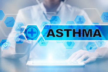 Medical doctor using tablet PC with asthma medical concept.