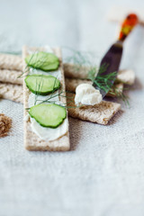 Stack of crispbreads with cream cheese