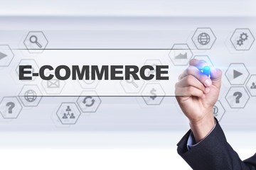 Businessman drawing on virtual screen. e-commerce concept.
