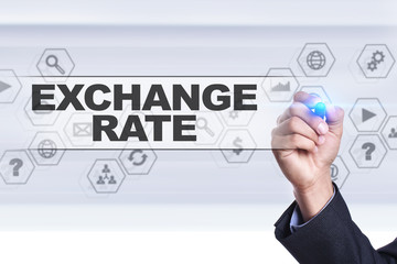 Businessman drawing on virtual screen. exchange rate concept.