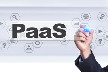 Businessman drawing on virtual screen. paas concept.