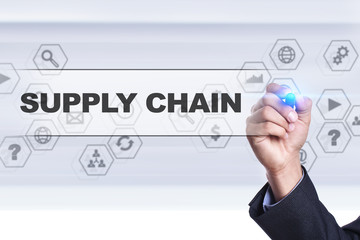 Businessman drawing on virtual screen. supply chain concept.