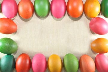 Fototapeta na wymiar Colorful easter eggs frame on marble flooring background