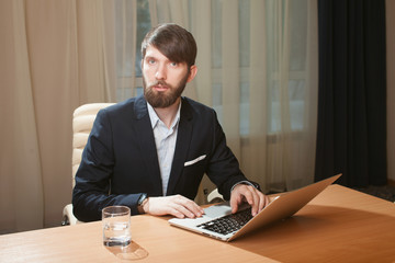 Fototapeta premium Businessman Using Laptop