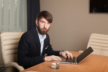 Businessman Using Laptop