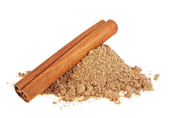 Cinnamon stick and powder on a white background