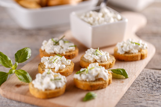 Fototapeta Cottage cheese on bruschetta
