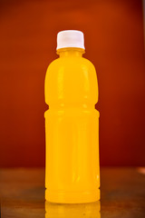 Orange juice bottle. Isolated on background