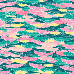 Vector boho hand drawn doodle seamless pattern with yellow, pink feathers on green background.