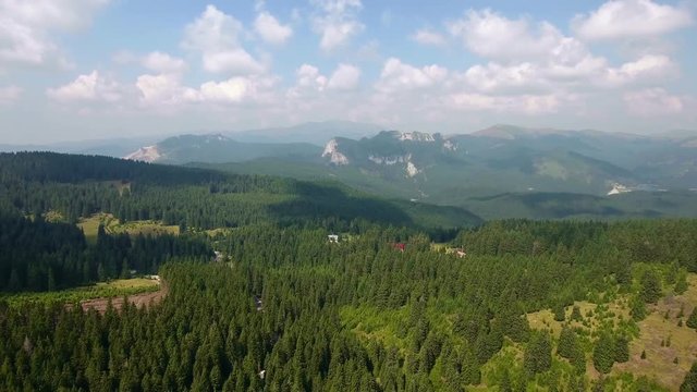 Aerial View. Flying over the beautiful forest and mountains. Landscape panorama.