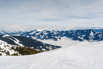 Obraz premium Sunny view of ski slope near Zell am Zee, Austria.