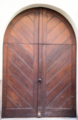 Vintage wooden brown door close-up