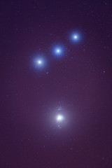 Obraz na płótnie Canvas Milky way stars on a dark sky - Orion's belt. 