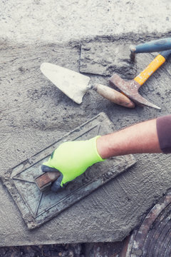 Renovating concrete pavement in home / budget DIY version.