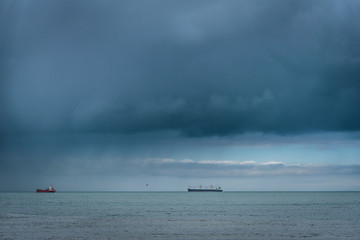 Ships in a dark sea