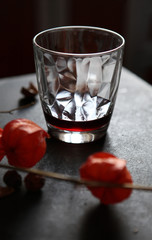  physalis and a glass