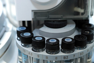  Bottles check on the quality of the suspension. Quality Control Laboratory medicine. Chromatograph operation.