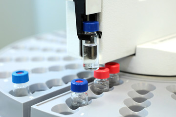  Bottles check on the quality of the suspension. Quality Control Laboratory medicine. Chromatograph...