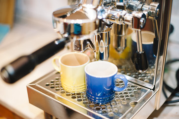 fresh coffee pouring through a bottomless portafilter 