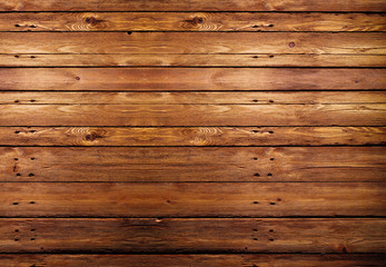 Vertical, top down aerial view of natural brown wooden planks textured grain background.