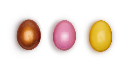 Looking down, vertical view of large colorful decorated Easter eggs isolated on a white background.